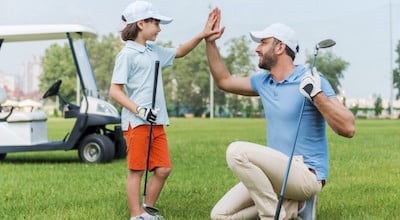 Kid golfing