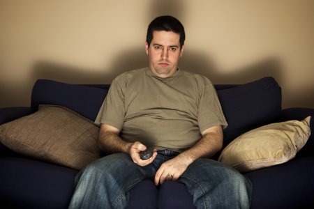 depositphotos_19311839-stock-photo-bored-overweight-man-sits-on